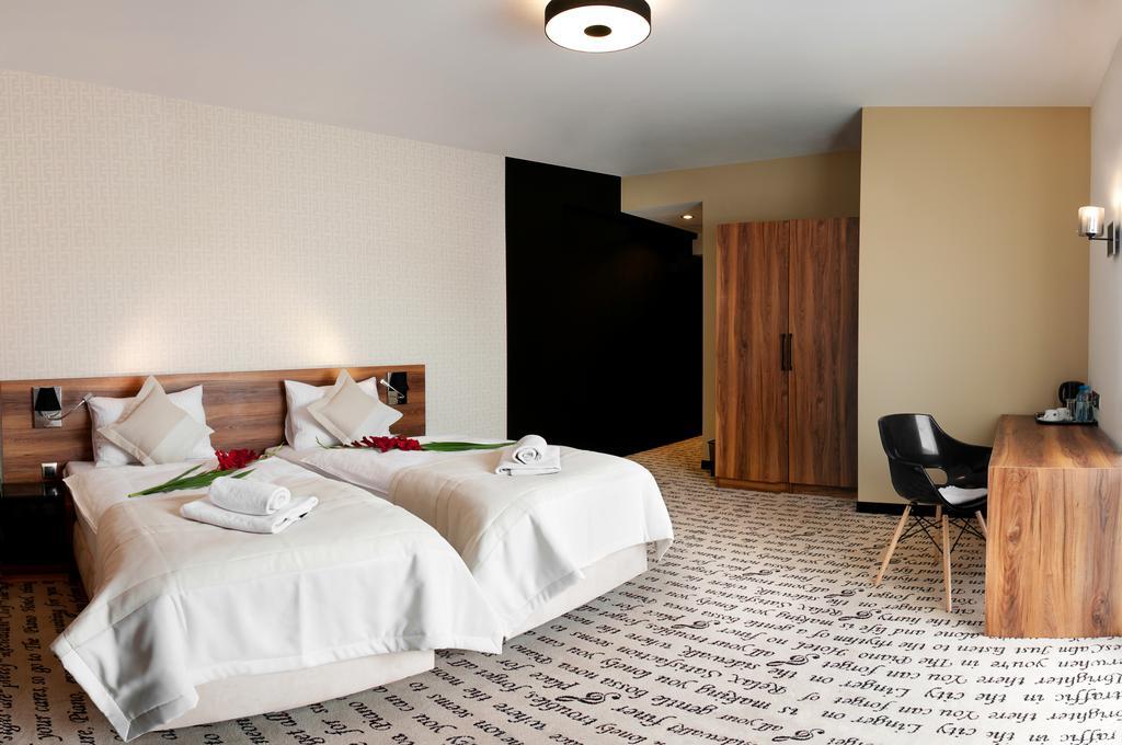 Hotel Piano Lublin Quarto foto